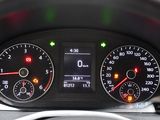 a close up of a car dashboard with various gauges and numbers