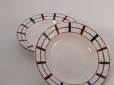 two plates with red, white and blue stripes on them