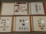 many different types of stamps on the pages of a book