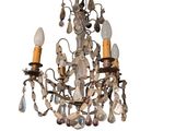 an image of a chandelier with three lights attached to it