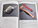 a book with a picture of a banana and a knife in it