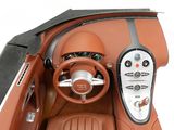 the interior of a sports car with a steering wheel and dashboard