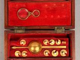 a wooden box with a set of tools inside of it
