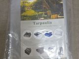 a bag of tarpaulin sitting on a table