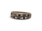 a close up of a ring on a white background