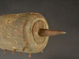 a large stone object with spikes sticking out of it