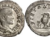a silver coin with an image of a man and a bird on it
