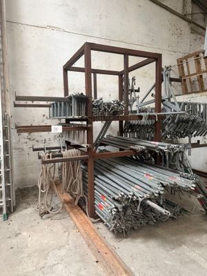 a large rack with a bunch of metal items on it