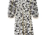 une robe blanche et noire ornée de fleurs noires et blanches