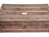 an old trunk that is sitting on a table