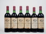 six bouteilles de vin sont alignées dans une rangée
