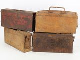 three old suitcases stacked on top of each other on a white surface