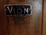 a close up of a wooden door with a sign on it