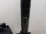 two vacuums that are on the floor next to each other