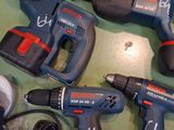 a lot of tools that are sitting on a table