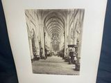 an old photo of a church with a black and white photo of a church