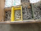 a box full of screws and bolts in it