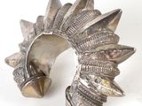 silver plated bracelet with spikes and spikes on it