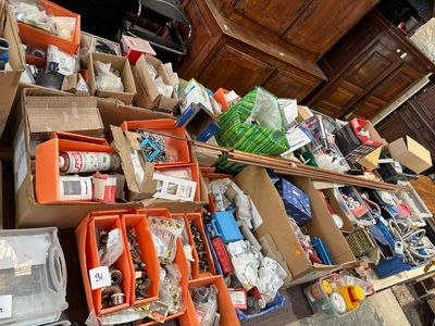 many boxes of assorted items on the floor