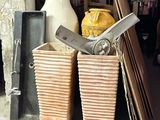 a pile of items that is sitting in a garage