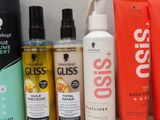 many different types of hair care products on a shelf