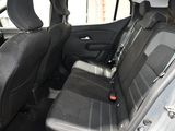 the back seats of a car are black in color
