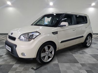 a picture of a white car parked in a garage
