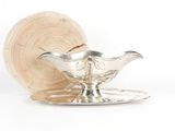 un service en argent ancien comprenant une soucoupe en argent et un bol en bois