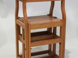 an image of a wooden shelf with three shelves on it