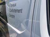 a van that is parked on the side of the road