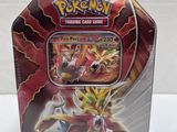 a close up of a box of pokemon trading cards on a table