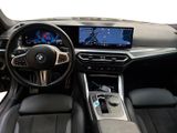 the interior of a bmw vehicle with a touch screen and a steering wheel