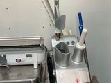 an image of a kitchen with a sink and a blender