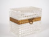 clear glass box with gold trim on white background