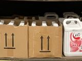 boxes of milk are stacked on the back of a truck