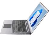 a laptop computer that is open on a white surface