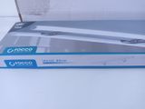 the box is open on a white surface with a blue handle