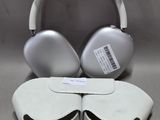 pair of white headphones sitting on top of each other on a table