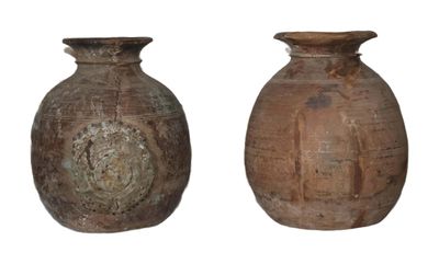 two brown vases sitting side by side on a white background