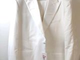 an image of a white suit hanging on a wall