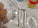 a person that is pouring something into a glass