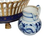 a blue and white bowl and a blue and white cup