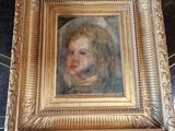 a picture of a painting of a child in a gold frame