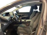 the interior of a car with the door open and the driver ' s seat down