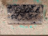 a plaque on the side of a building that reads