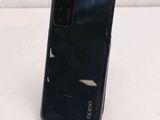 a close up of the back of an oppo phone on a table