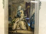a picture of a woman sitting in a chair with a harp