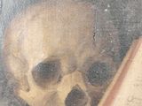 a painting of a skull and a book on a table