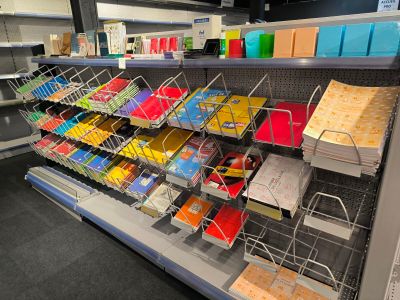 many books on the shelves in the store