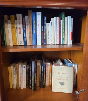 a book shelf with a bunch of books on it